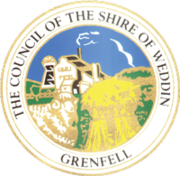 Logo of The Council of the Shire of Weddin with a scenic design.