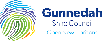 Gunnedah Shire Council logo with colorful abstract design and text.